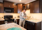 Thumbnail 5 of 13 - Spacious Kitchen in East Lansing Apartments near Michigan State University | North Pointe