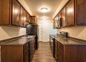 Thumbnail 4 of 9 - Spacious Kitchen in East Lansing Apartments near Michigan State University | Oakridge