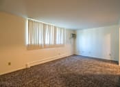 Thumbnail 6 of 9 - Spacious Living room in East Lansing Apartments near Michigan State University | Oakridge