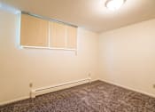 Thumbnail 8 of 9 - Spacious Living room in East Lansing Apartments near Michigan State University | Oakridge