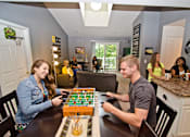 Thumbnail 1 of 4 - Spacious Living room in East Lansing Apartments near Michigan State University | Olde Farm