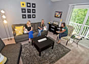Thumbnail 2 of 4 - Spacious Living room in East Lansing Apartments near Michigan State University | Olde Farm