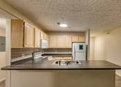 Thumbnail 1 of 7 - Spacious Kitchen in East Lansing Apartments near Michigan State University | Park Place