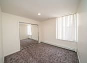 Thumbnail 7 of 14 - Spacious bedrooms in East Lansing Apartments near Michigan State University | River Park