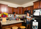Thumbnail 2 of 19 - Spacious Kitchen in East Lansing Apartments near Michigan State University | River Walk