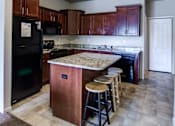 Thumbnail 16 of 19 - Spacious Kitchen in East Lansing Apartments near Michigan State University | River Walk
