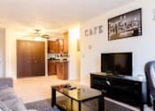 Thumbnail 3 of 10 - Spacious Living room in East Lansing Apartments near Michigan State University | Stoneridge
