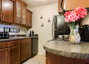 Thumbnail 5 of 10 - Spacious Kitchen in East Lansing Apartments near Michigan State University | Stoneridge