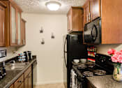 Thumbnail 6 of 10 - Spacious Kitchen in East Lansing Apartments near Michigan State University | Stoneridge