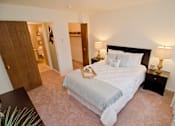 Thumbnail 6 of 9 - Spacious bedroom at Summerhill Estates Apartments in Lansing, MI