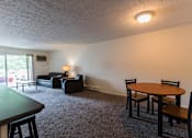 Thumbnail 8 of 15 - Spacious Living room in East Lansing Apartments near Michigan State University | Waters Edge