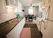 Thumbnail 1 of 14 - Spacious Kitchen in East Lansing Apartments near Michigan State University | Woodbrook Village Apartments
