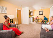Thumbnail 1 of 6 - Spacious Living room in East Lansing Apartments near Michigan State University | Woodside