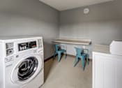 Thumbnail 21 of 28 - Laundry room