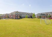 Thumbnail 28 of 30 - Soccer Area at The Heritage at Arlington Apartment Homes, North Carolina