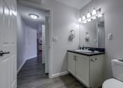 Thumbnail 12 of 19 - Master Bath Lighting at Carisbrooke at Manchester Apartments, Manchester, New Hampshire