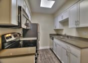 Thumbnail 10 of 38 - Electric Range In Kitchen at 720 North Apartments, Sunnyvale, CA, 94085