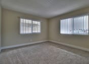 Thumbnail 15 of 38 - Carpeted Living Area at 720 North Apartments, California