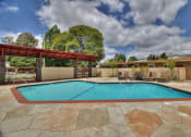 Thumbnail 5 of 38 - Swimming Pool with Lounge Seating at 720 North Apartments, Sunnyvale, CA, 94085