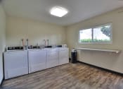 Thumbnail 38 of 38 - Laundry Room at 720 North Apartments, California