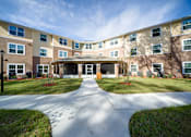 Thumbnail 8 of 20 - Caroline Oaks Apartments Exterior