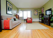 Thumbnail 1 of 12 - Spacious Living Room at Amber Square Apartments