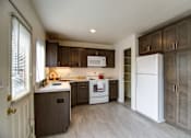 Thumbnail 4 of 12 - Remodeled Kitchen with Dark Cabinets