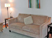 Thumbnail 2 of 5 - Living room at Woodruff House Apartments in Lansing, MI