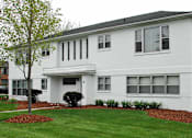 Thumbnail 1 of 6 - Exterior at White House Apartments in Lansing, MI