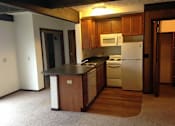 Thumbnail 2 of 6 - Kitchen at White House Apartments in Lansing, MI