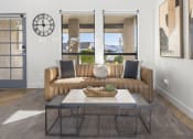 Thumbnail 6 of 24 - a living room with a couch and a coffee table