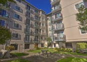 Thumbnail 4 of 20 - Property Courtyard at King Arthurs Court, Seattle, WA