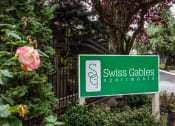 Thumbnail 2 of 30 - Property Signage at Swiss Gables Apartment Homes, Kent, 98032