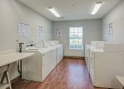 Thumbnail 27 of 32 - Laundry room