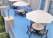 Thumbnail 24 of 46 - Common area with seating for comm