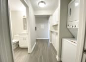 Thumbnail 19 of 46 - View of laundry with bathroom and storage