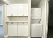Thumbnail 20 of 46 - Laundry in unit with cabinets