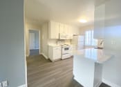 Thumbnail 7 of 46 - Kitchen with Island and view of hallway