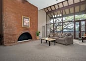 Thumbnail 20 of 45 - Meeting area With Fireplace at Wilbur Oaks Apartments, California, 91360