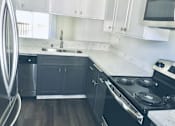 Thumbnail 21 of 45 - Fully-Equipped Kitchens at Wilbur Oaks Apartments, Thousand Oaks