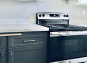 Thumbnail 24 of 45 - Kitchen With New Appliances at Wilbur Oaks Apartments, California, 91360