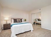 Thumbnail 42 of 45 - Table Lamp, Pillow In Bedroom at Wilbur Oaks Apartments, Thousand Oaks, CA