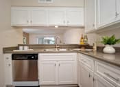 Thumbnail 36 of 45 - Granite Counter Tops, Coffee Cup In Kitchen at Wilbur Oaks Apartments, Thousand Oaks, CA, 91360
