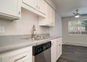 Thumbnail 30 of 40 - Granite Counter Tops In Kitchen at St. Charles Oaks Apartments, Thousand Oaks, California