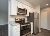 Thumbnail 25 of 40 - Kitchen Appliances at St. Charles Oaks Apartments, California