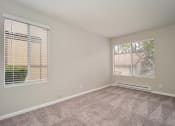 Thumbnail 11 of 40 - Relaxing Living Room With Window at St. Charles Oaks Apartments, Thousand Oaks