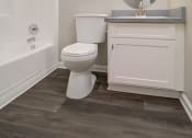 Thumbnail 39 of 40 - Tub, Toilet In Bathroom at St. Charles Oaks Apartments, California, 91360