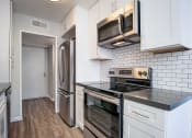 Thumbnail 25 of 67 - Kitchen With New Appliances at Los Robles Apartments, Pasadena, CA