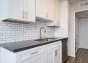 Thumbnail 26 of 67 - Dishwasher in Kitchen at Los Robles Apartments, Pasadena, 91101