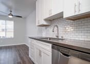 Thumbnail 27 of 67 - Stainless Steel Sink In Kitchen at Los Robles Apartments, Pasadena, California